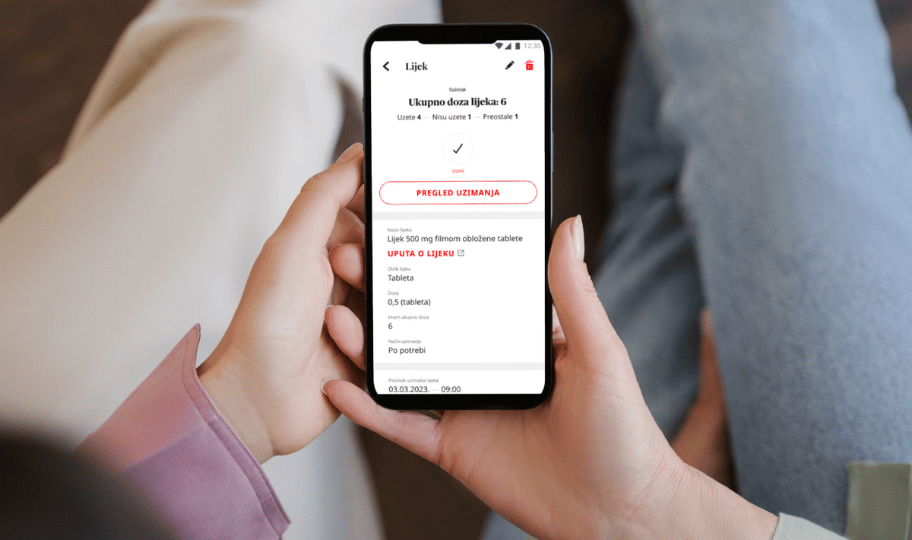 ruke osobe koje drže pametni telefon na kojem je otvorena aplikacija meddox
